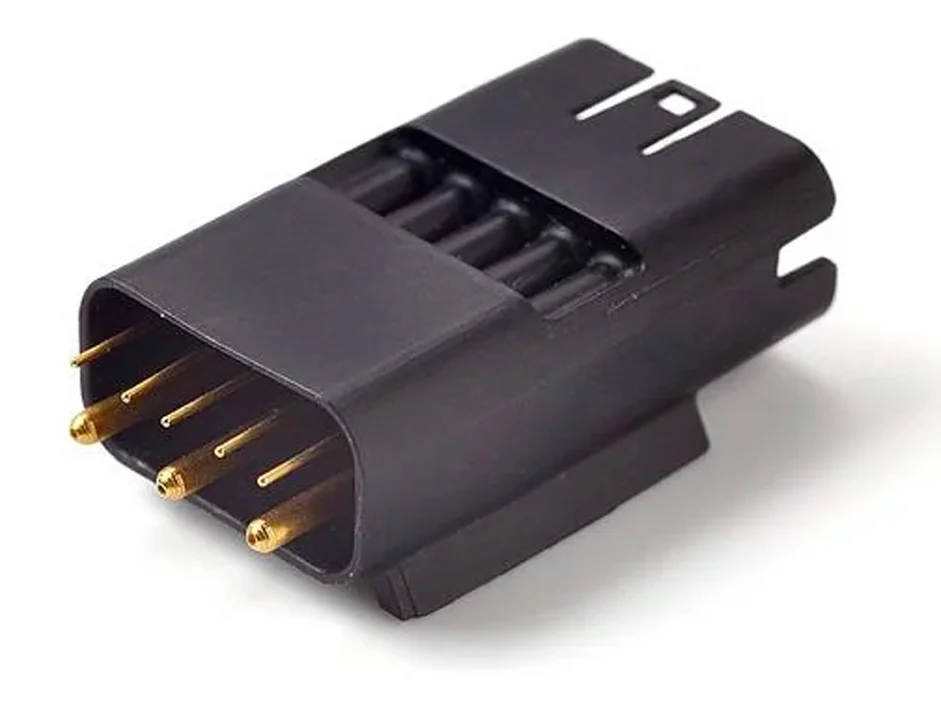 Custom automotive interconnect pin assembly